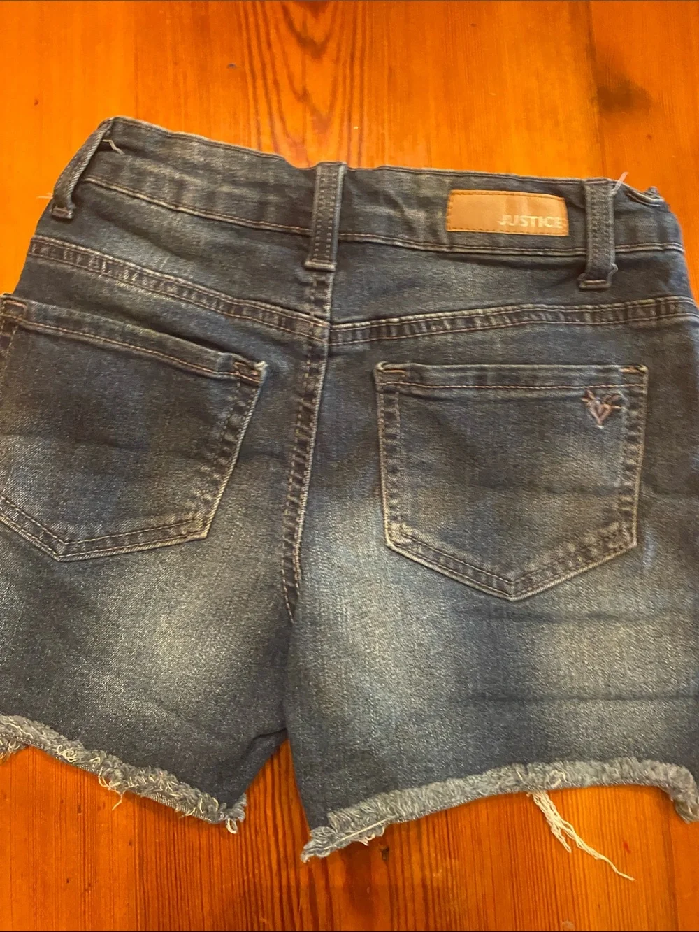 Justice White Graphic Tee with Dark Blue Distressed Jean Shorts